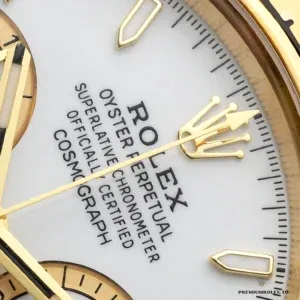 Crown and chronograph pushers on the Daytona 126508 yellow gold-plated case