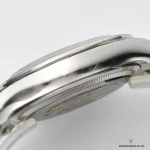 Close-up of silver dial with gem-set markers and chronograph registers