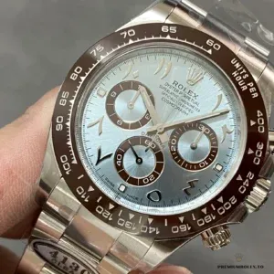 Close-up of ice blue dial with Arabic-indic markers and subdials