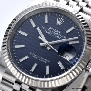 Datejust 126334 at angle showing fluted bezel and fluted dial interplay