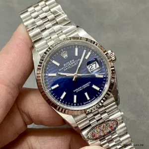 Datejust 126234 blue dial at angle showing sunburst depth and colour shift