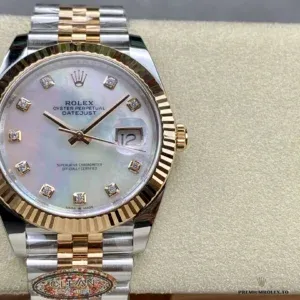 Fluted Everose gold-plated bezel ridges catching warm light on the Datejust 126331