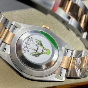 Close-up of mother of pearl surface and diamond hour markers on 126333