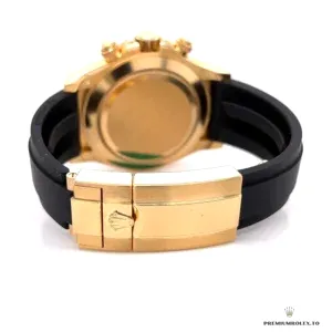 Daytona 116518 side profile showing screw-down chronograph pushers and gold-plated case