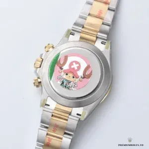 Close-up of champagne dial with gold subdials on the two-tone 116523