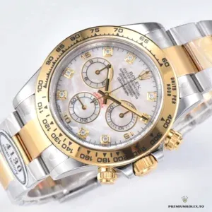 Gold-plated crown and pushers contrasting steel case on the Daytona 116523