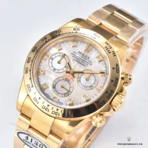Wrist shot of the Daytona 116528 mother of pearl yellow gold model