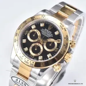 Rolex Daytona 116503 crown and pusher detail in yellow gold plating