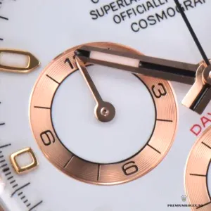 White dial macro with applied rose gold hour markers visible