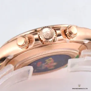 Daytona 116505 side profile showing rose gold-plated case and tachymeter