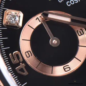 Close-up of black dial with diamond markers on the Everose Daytona