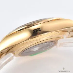 Daytona 116508 side profile showing screw-down pushers and gold Oyster bracelet