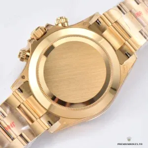 Dial macro showing applied gold markers and luminescent hands