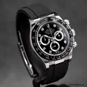 Close-up of black dial with diamond hour markers on the 116519LN