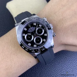 Daytona 116519LN side angle showing white gold-plated case and Cerachrom bezel