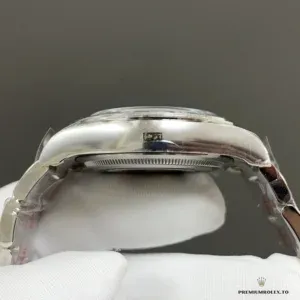 Daytona 126500LN side profile showing Oystersteel case and pushers