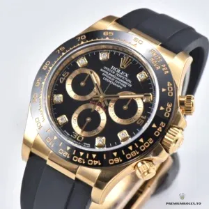 Crown and chronograph pushers on the 126518LN yellow gold-plated case