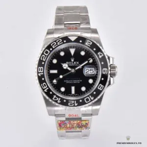 Rolex GMT-Master 116710LN green GMT hand and date window detail