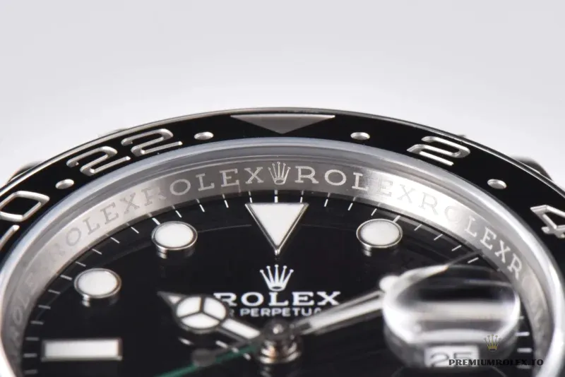 Rehaut engraving around a black GMT-Master II 116710LN dial, seen through the crystal