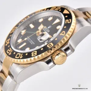 Rolex GMT-Master 116713LN at angle showing bezel scale and date window