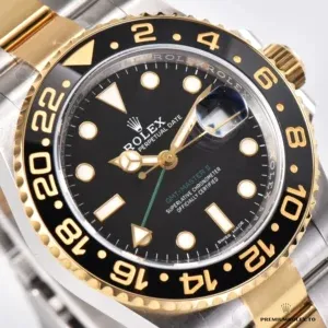 Two-tone GMT-Master II 116713LN with black dial and black-and-gold-toned 24-hour bezel