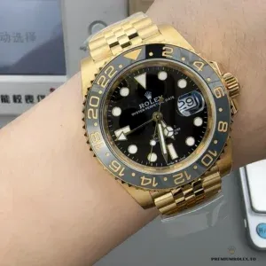 GMT-Master 126718GRNR grey-black Cerachrom bezel detail in yellow gold plating