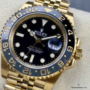 Crown and case side detail on the 126718GRNR yellow gold GMT-Master