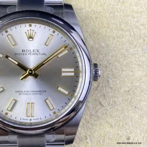 Rolex Oyster Perpetual 124300 lume shot showing blue luminescence