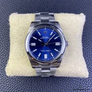 Blue dial colour shift visible under warm indoor lighting