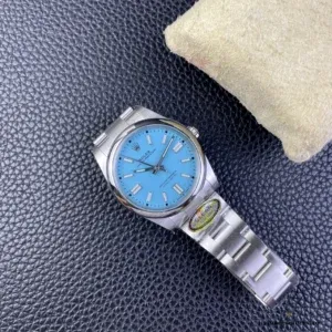 Smooth domed bezel framing the vivid blue dial surface