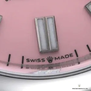 Mercedes hands and hour markers detail on pink sunburst dial