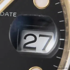 Macro of the date window under the Cyclops lens on a black-dial Submariner 126618LN