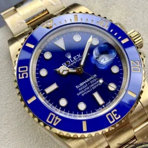 Angled macro of the Submariner 126618LB blue bezel insert and dial markers under side light