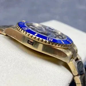 Submariner 126618LB at angle showing bezel graduation and Cyclops lens