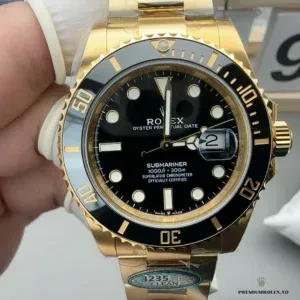 Crown guard and Triplock crown in yellow gold plating on the 126618LN