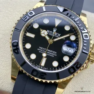 Yacht-Master 226658 at angle showing gold against black Oysterflex contrast