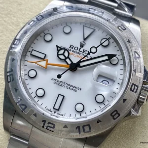 Explorer II 226570 side profile showing fixed bezel with numerals