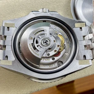 Rootbeer brown-black bezel option displayed alongside other GMT pieces