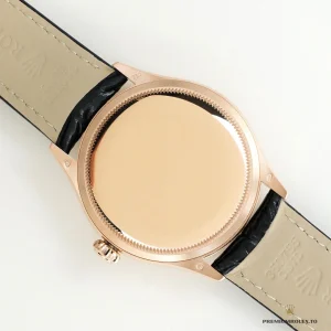 Crown side of the Cellini 50525 Everose gold-plated case
