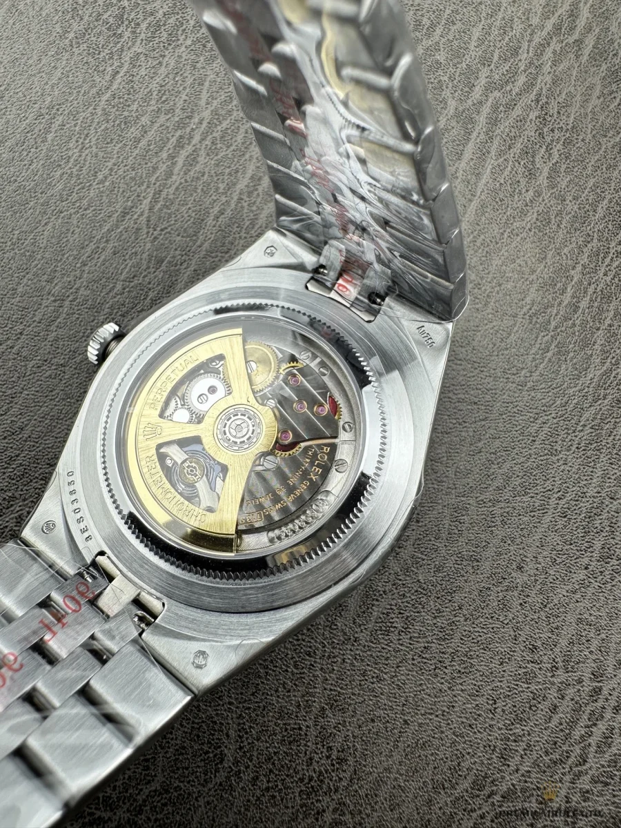 Display caseback of the 127336 with gold-tone rotor, bracelet opened