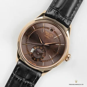 Second timezone subdial at 6 with day/night indicator