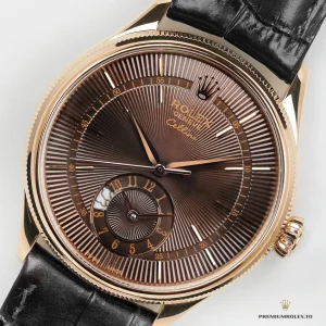 Brown guilloche dial texture shifting in ambient light