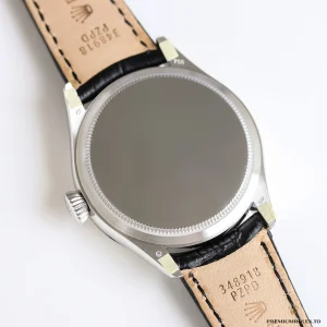 Full dial layout showing moon phase and pointer date together