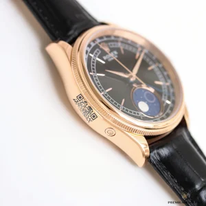 Blue enamel moon phase aperture with meteorite disc close-up