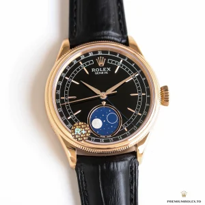 Everose gold dauphine hands against black lacquered dial