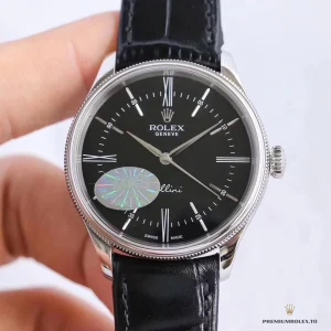 Close-up of elongated hour markers on black lacquer dial
