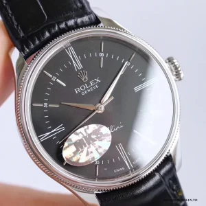 Dauphine hands and railway minute track on Cellini dial