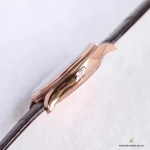 Everose gold deployant clasp on leather strap