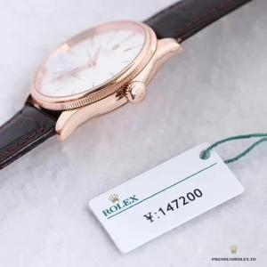 Dauphine hands and minute track detail on white dial