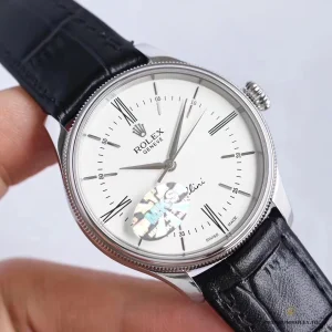 Side profile showing double bezel — domed and fluted rings on Cellini